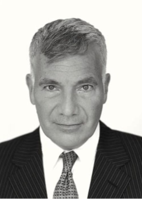 Edward George West Virginia Black and white portrait of a middle-aged man with short gray hair, wearing a pinstripe suit and patterned tie, looking directly at the camera with a neutral expression.